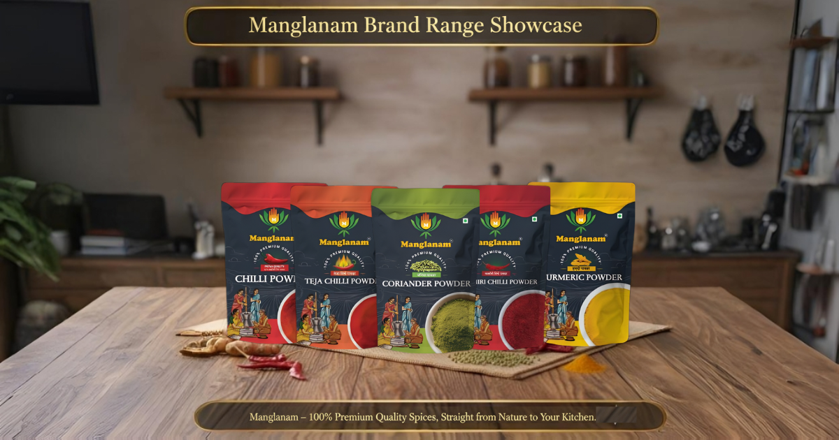 Manglanam brand spice packets displayed on a wooden table with a kitchen background.